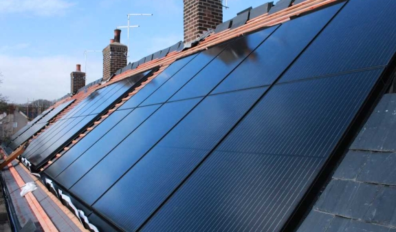 Photovoltaic panels installed across a residential roof